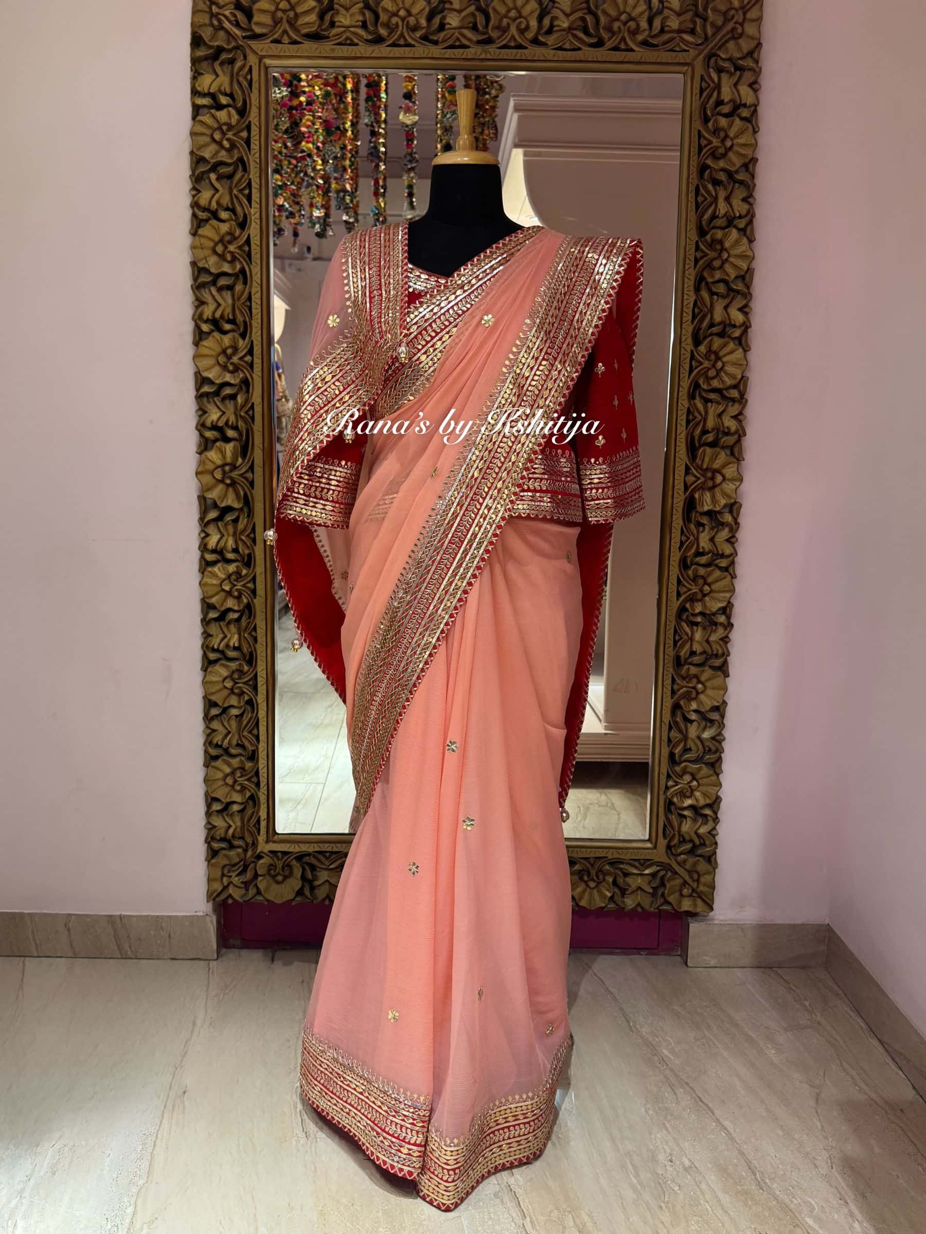 Eternal Elegance in Peach and Red Saree thumbnail 2