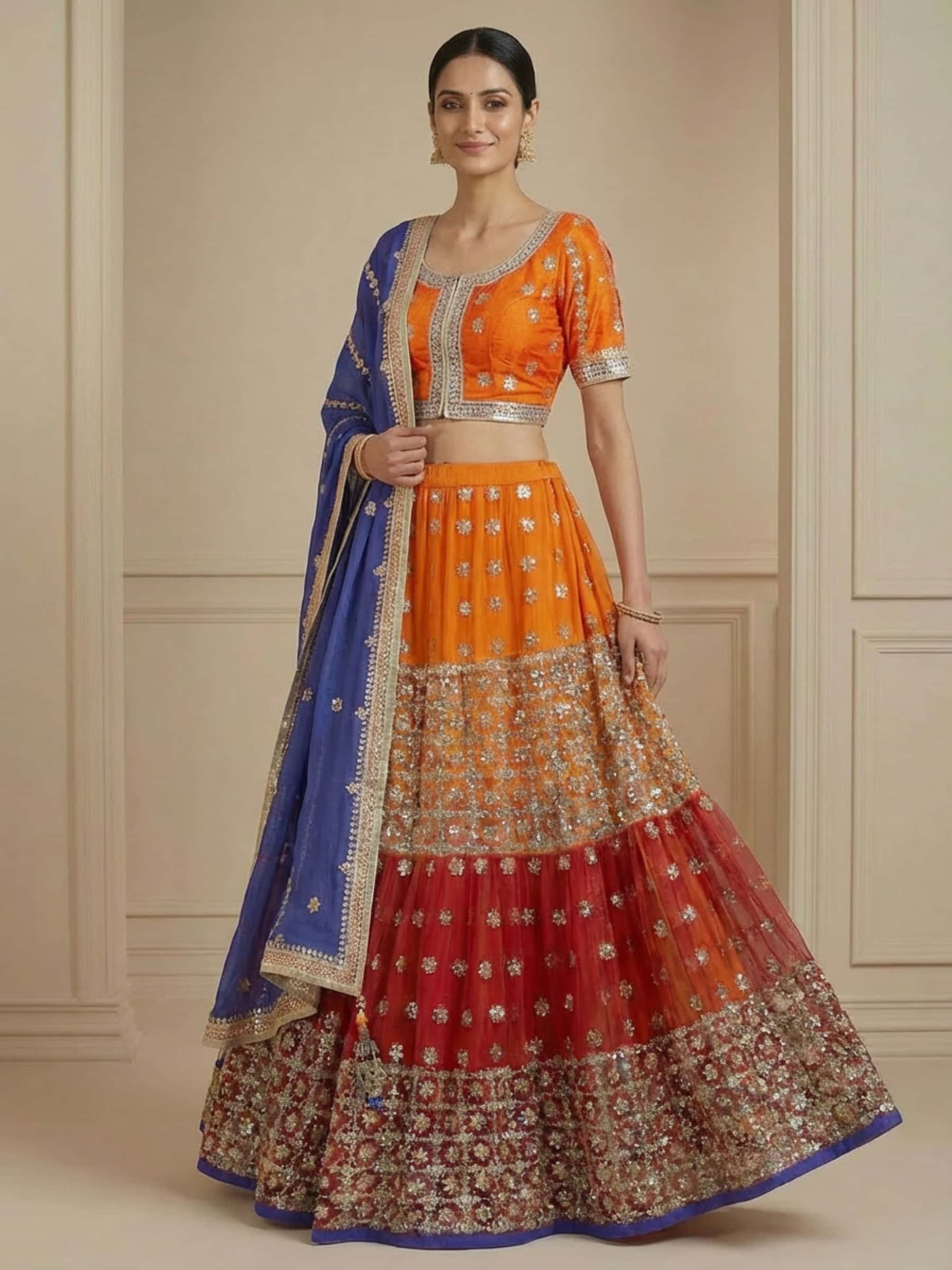 Layered Red and Orange Rich Gota Lehenga Choli Set - Image 1