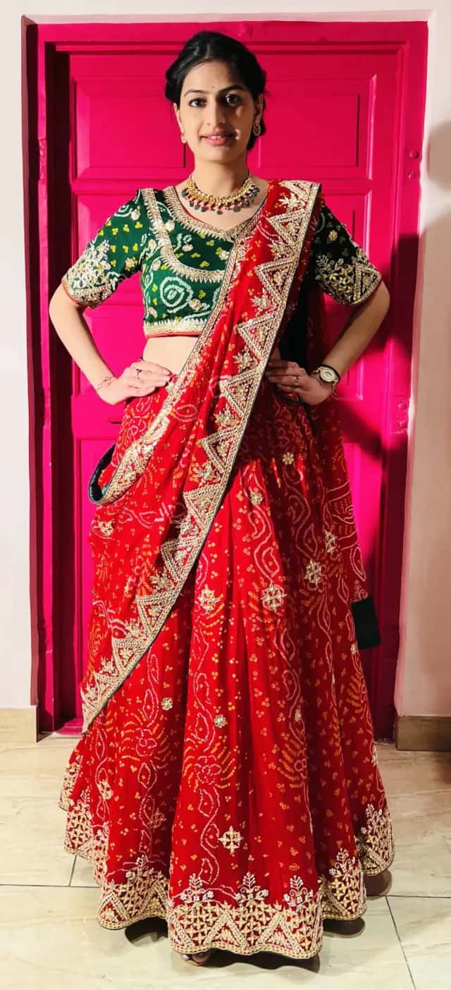 Red and Green Bandhani Lehenga in Pearl Gota